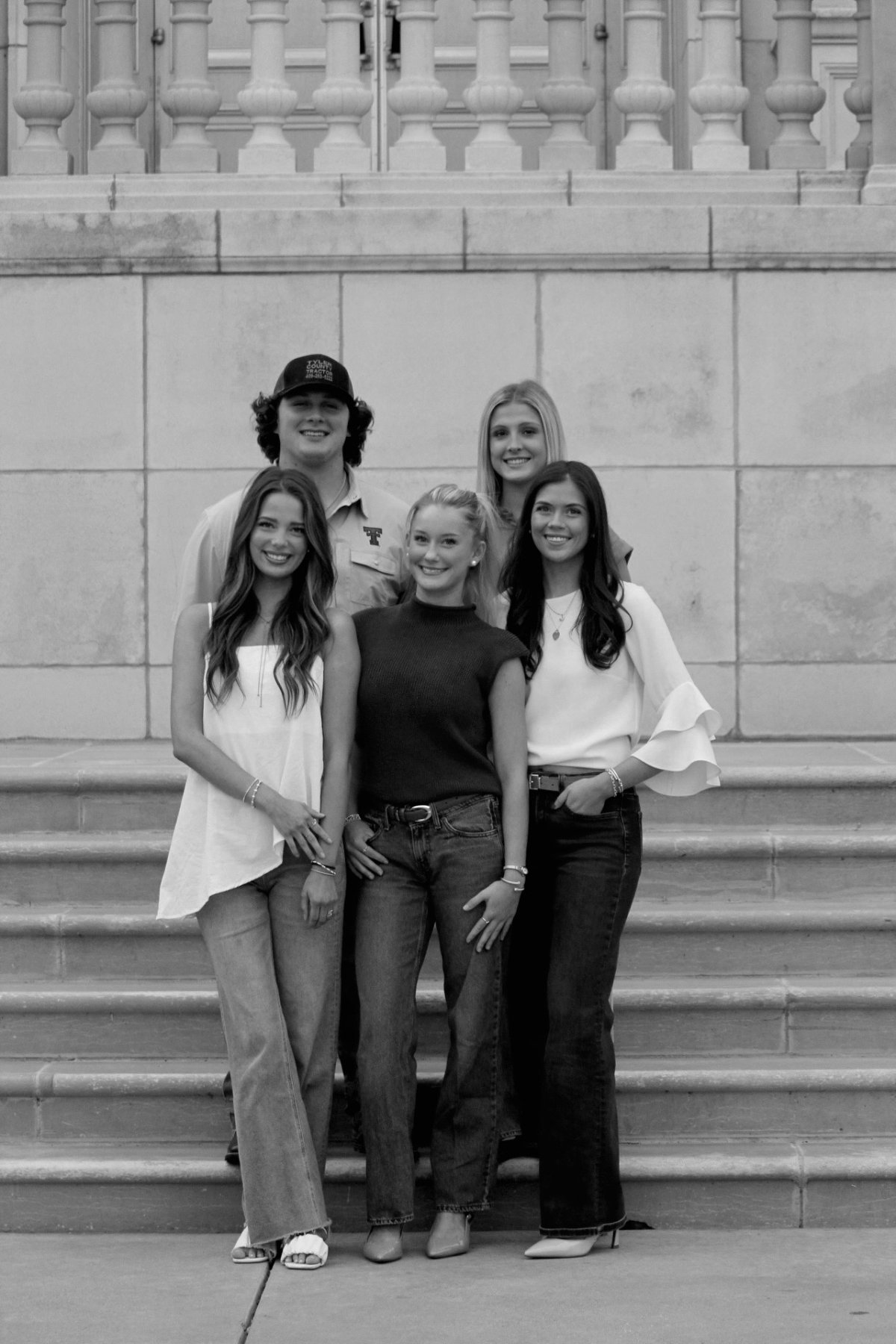 The Lubbock Coolers team on the steps of a Texas Tech building